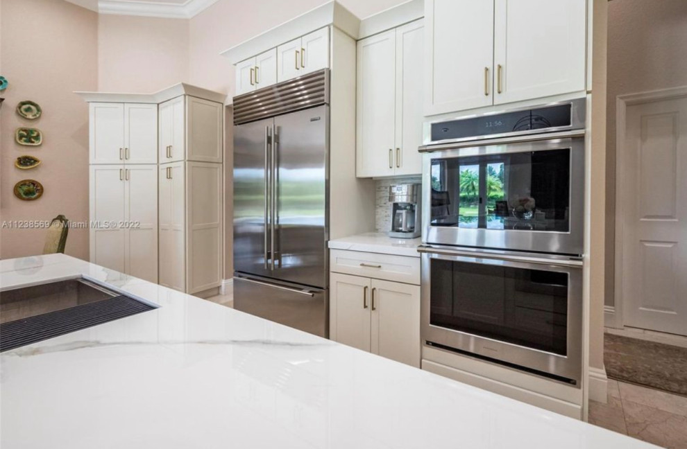 Inspiration for a transitional kitchen remodel in Miami