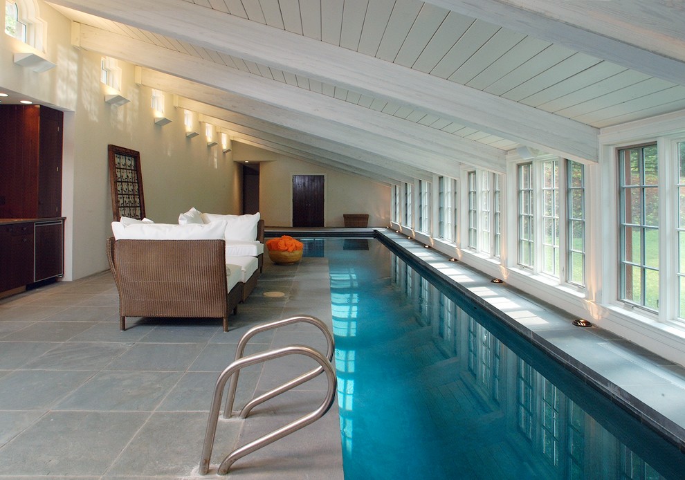 This is an example of a transitional indoor pool in Philadelphia.