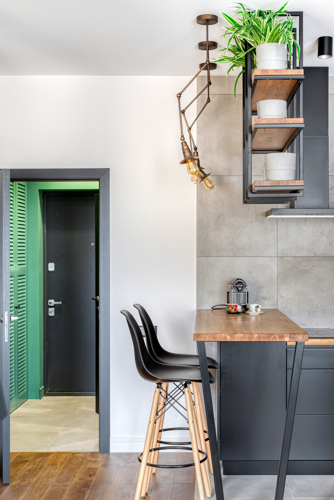 Студия в стиле лофт для холостяка: зона кухни