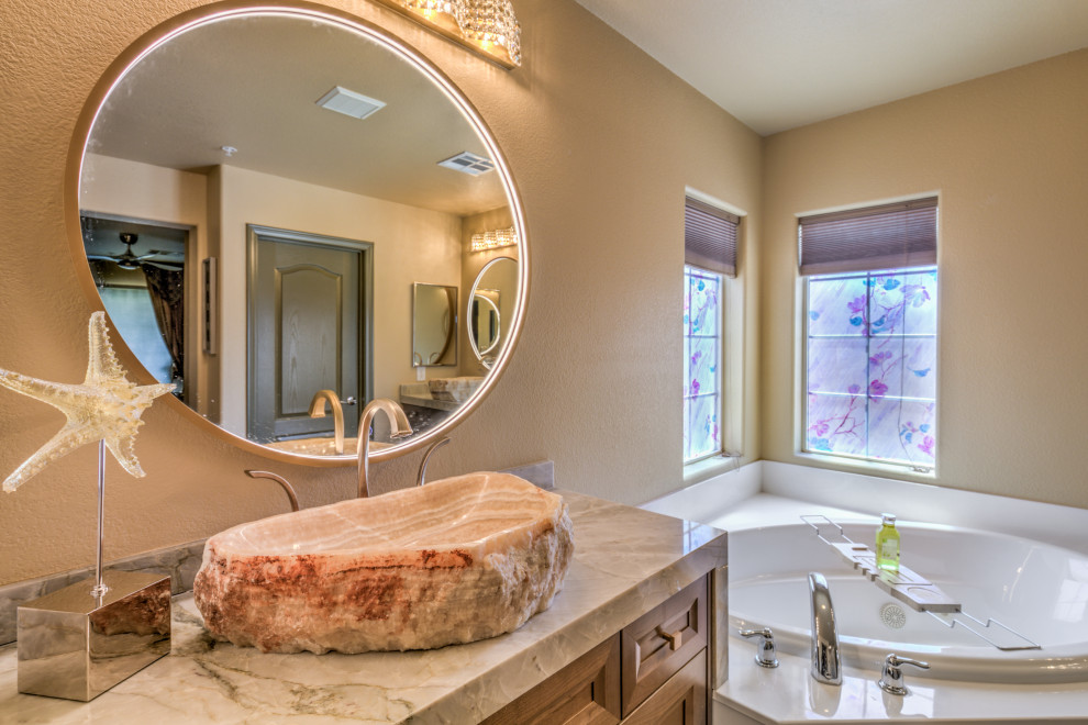 Example of a transitional home design design in Las Vegas