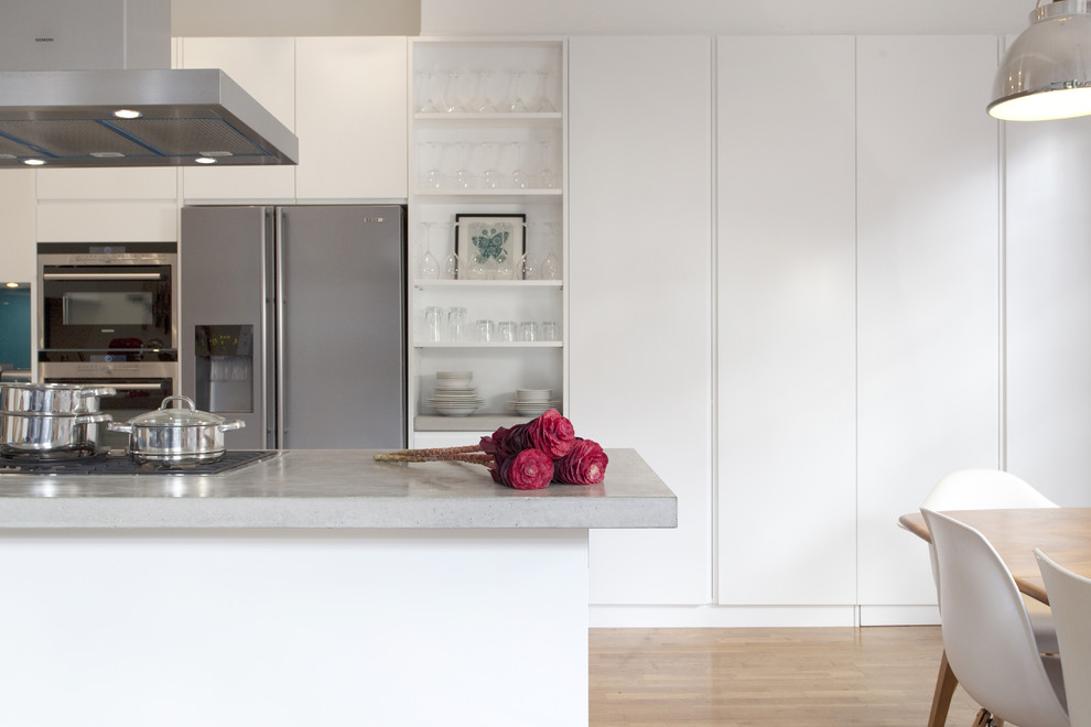 Inspiration for a contemporary kitchen in London with stainless steel appliances.
