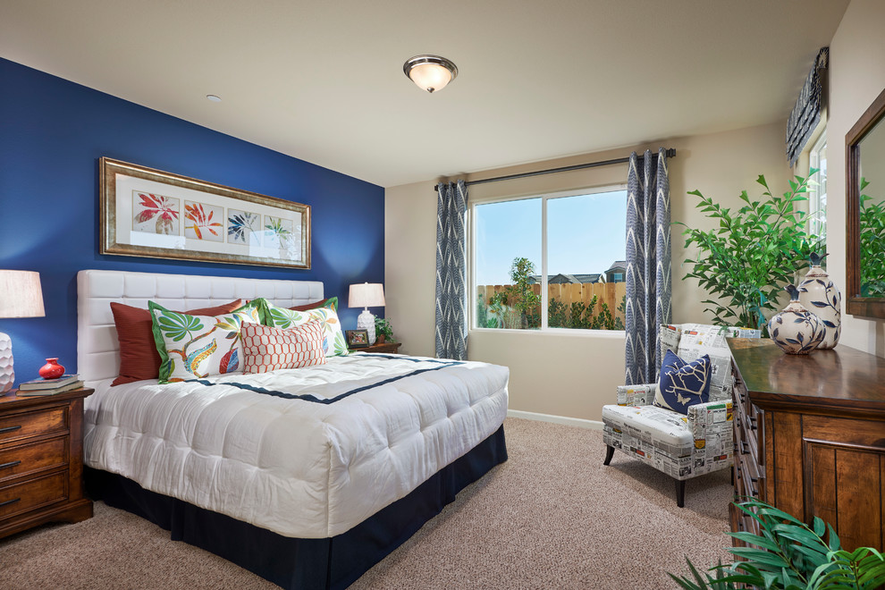 Transitional carpeted and beige floor bedroom photo with blue walls