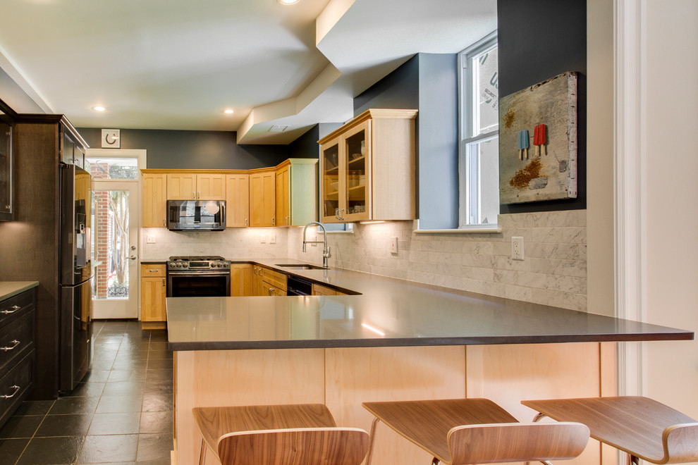Mid-sized transitional kitchen photo in DC Metro with recessed-panel cabinets, quartz countertops, stainless steel appliances and a peninsula