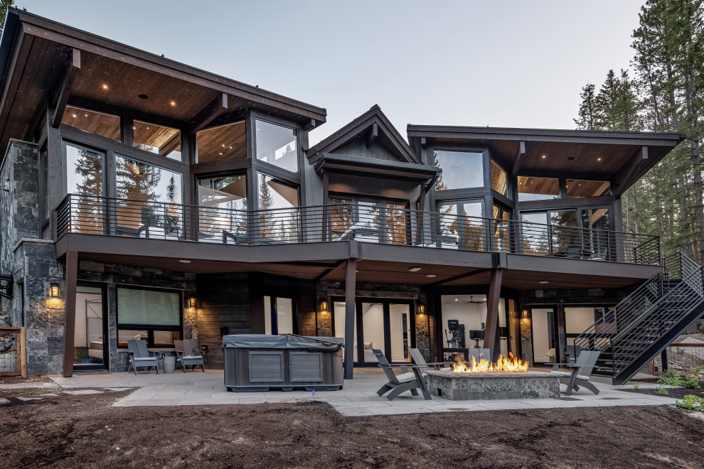 Example of a transitional home design design in Denver