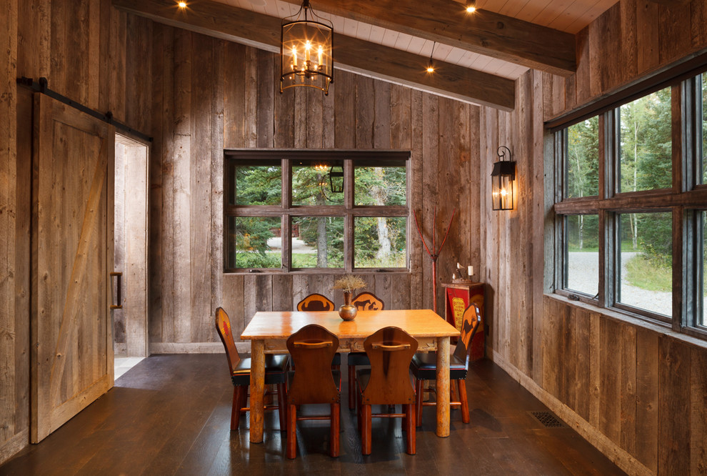 Country separate dining room in Salt Lake City with dark hardwood floors.