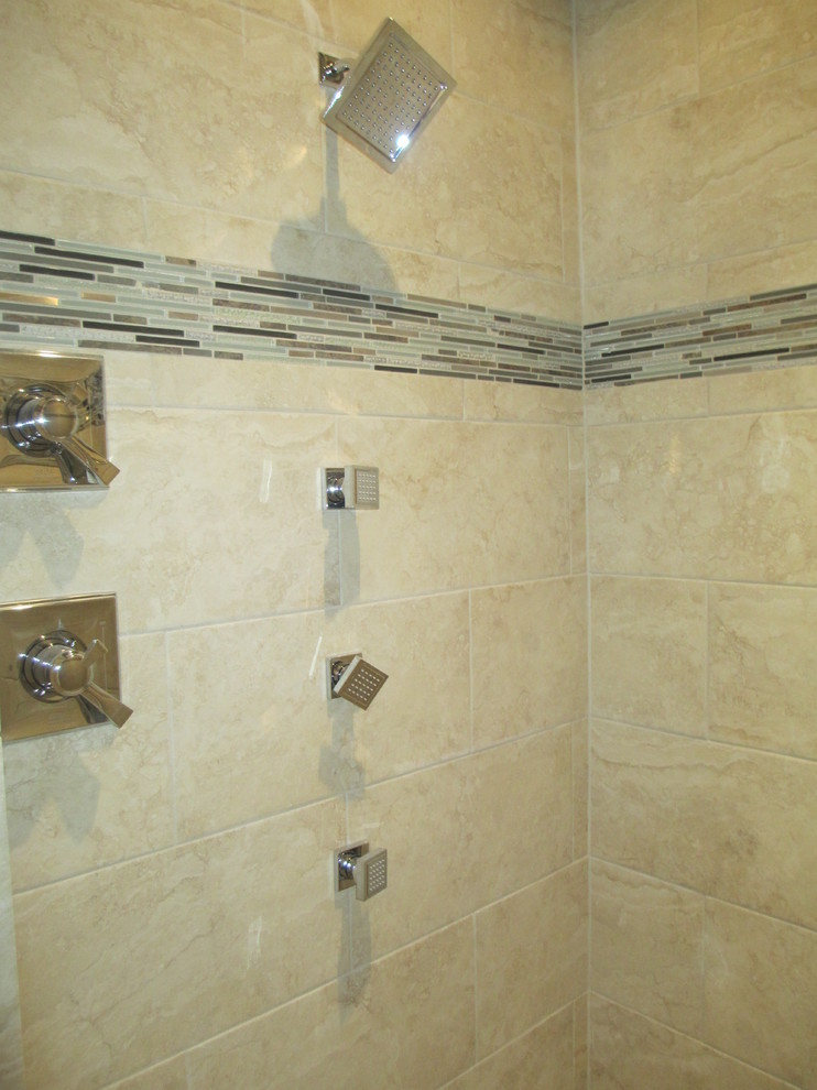 Mid-sized transitional master bathroom in Other with an undermount sink, a corner tub, a curbless shower, a two-piece toilet, beige tile, porcelain tile, multi-coloured walls and porcelain floors.