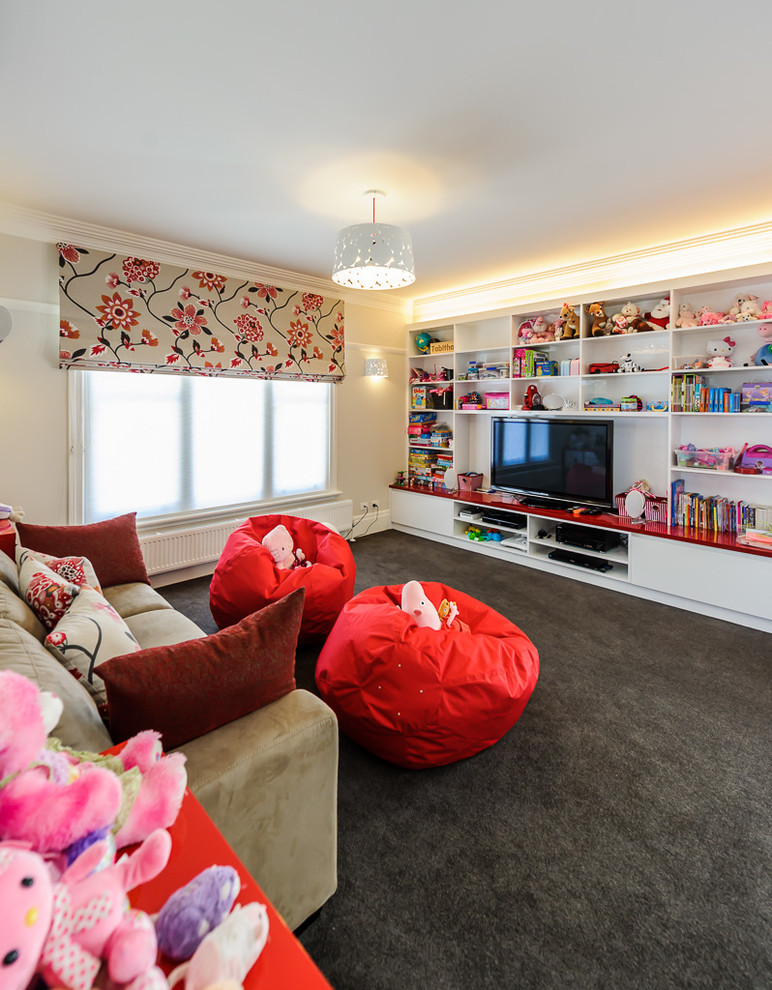 This is an example of a large modern gender-neutral kids' playroom in Melbourne with white walls, carpet and grey floor.
