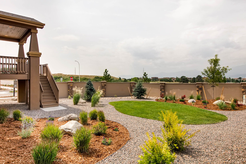 Example of a mountain style home design design in Denver