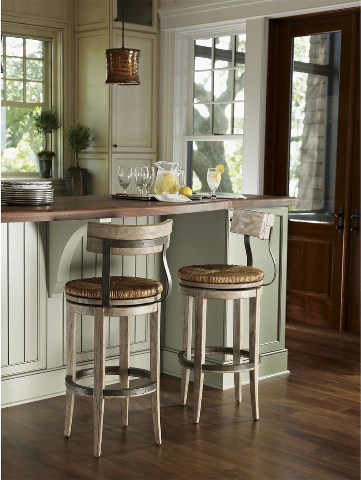 Kitchen - small rustic dark wood floor kitchen idea in New York with shaker cabinets, distressed cabinets, wood countertops and an island