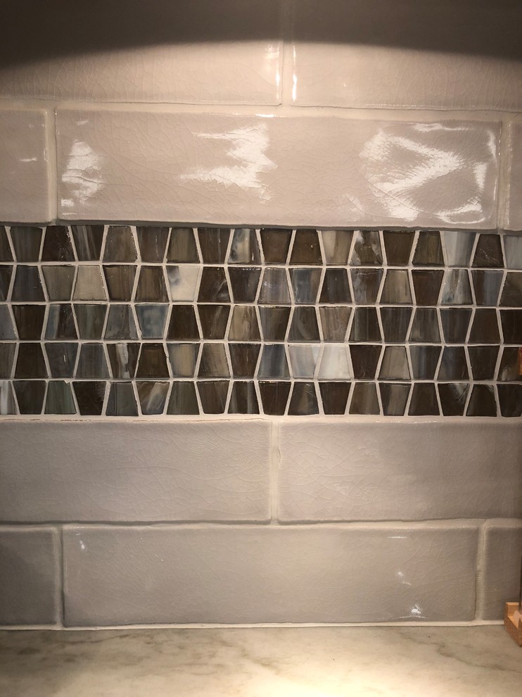 Inspiration for a large transitional galley medium tone wood floor and brown floor eat-in kitchen remodel in Baltimore with a single-bowl sink, recessed-panel cabinets, white cabinets, quartzite countertops, gray backsplash, glass tile backsplash, stainless steel appliances, an island and multicolored countertops