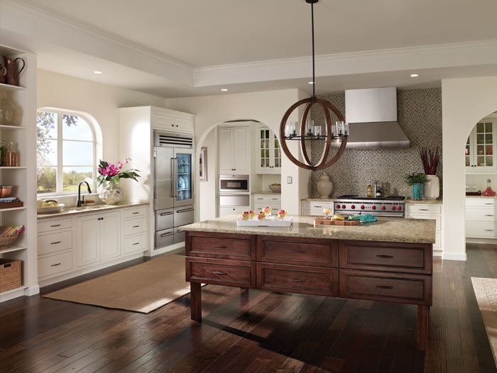 Large transitional l-shaped dark wood floor open concept kitchen photo in Philadelphia with a single-bowl sink, raised-panel cabinets, white cabinets, granite countertops, stainless steel appliances and an island