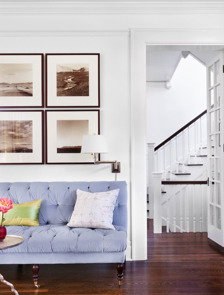Mid-sized transitional dark wood floor and brown floor hallway photo in Austin with white walls