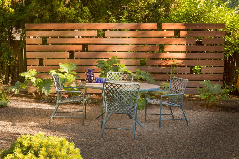 Inspiration for a mid-sized contemporary backyard garden in Portland with concrete pavers.
