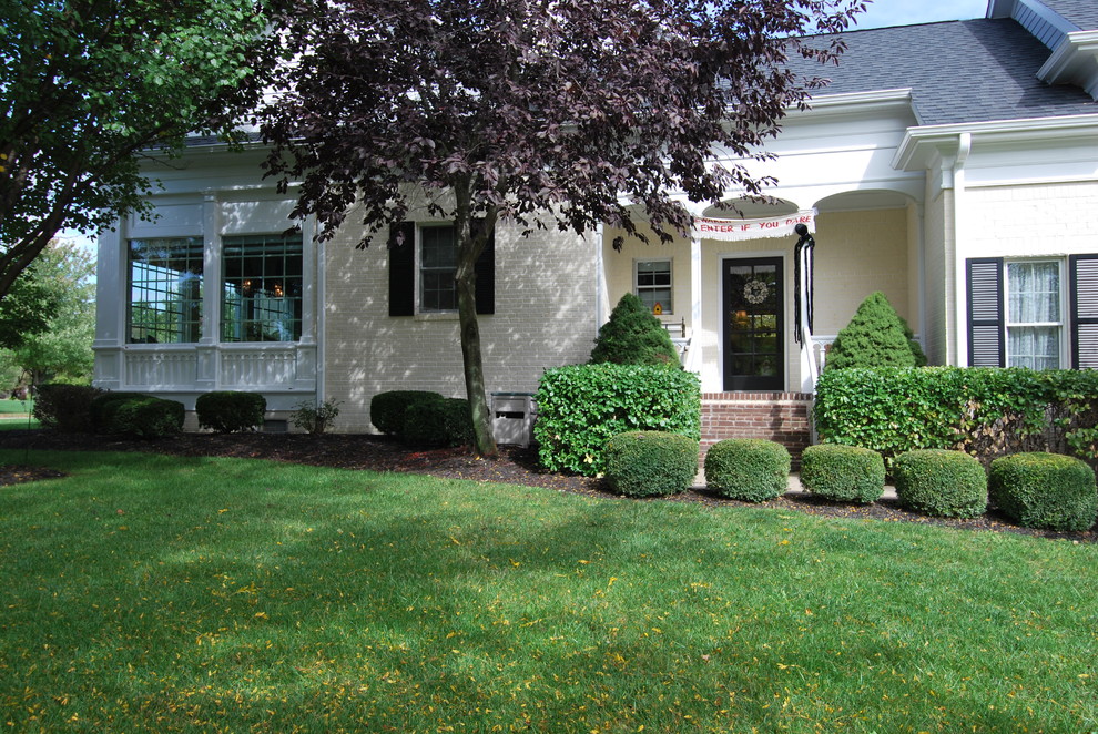 Example of a transitional exterior home design in Indianapolis