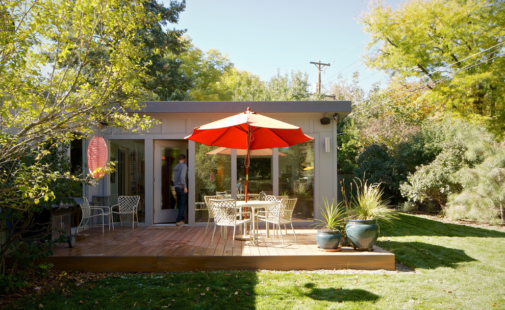 This is an example of a midcentury deck in Denver.