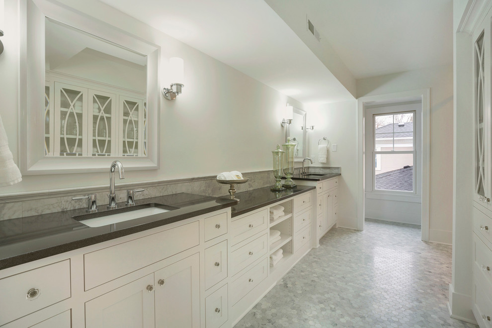 Photo of a large transitional master bathroom in Minneapolis with white walls, shaker cabinets, white cabinets, an open shower, black and white tile, gray tile, stone tile, marble floors and an undermount sink.