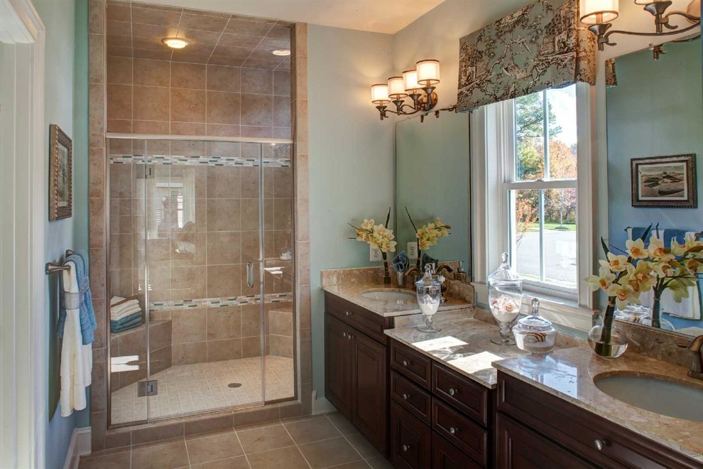 Inspiration for a beach style master bathroom in Other with dark wood cabinets, beige tile and blue walls.