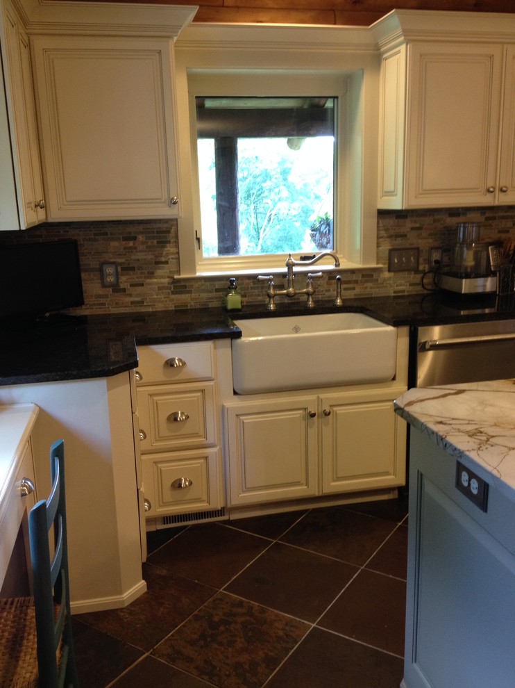 Slate floor kitchen photo with quartzite countertops, green backsplash and stone tile backsplash