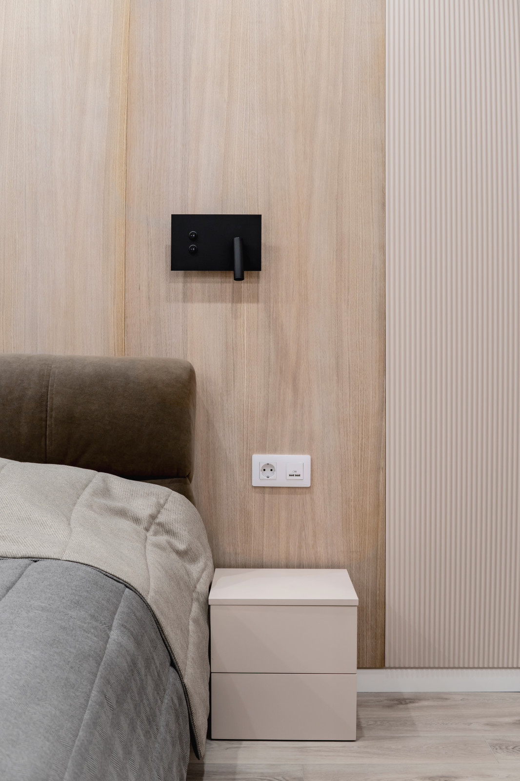 Spacious bedroom with contemporary wood paneling.new build interior ideas uk