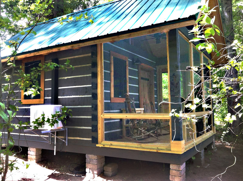 Small mountain style front yard patio photo with decking and a gazebo