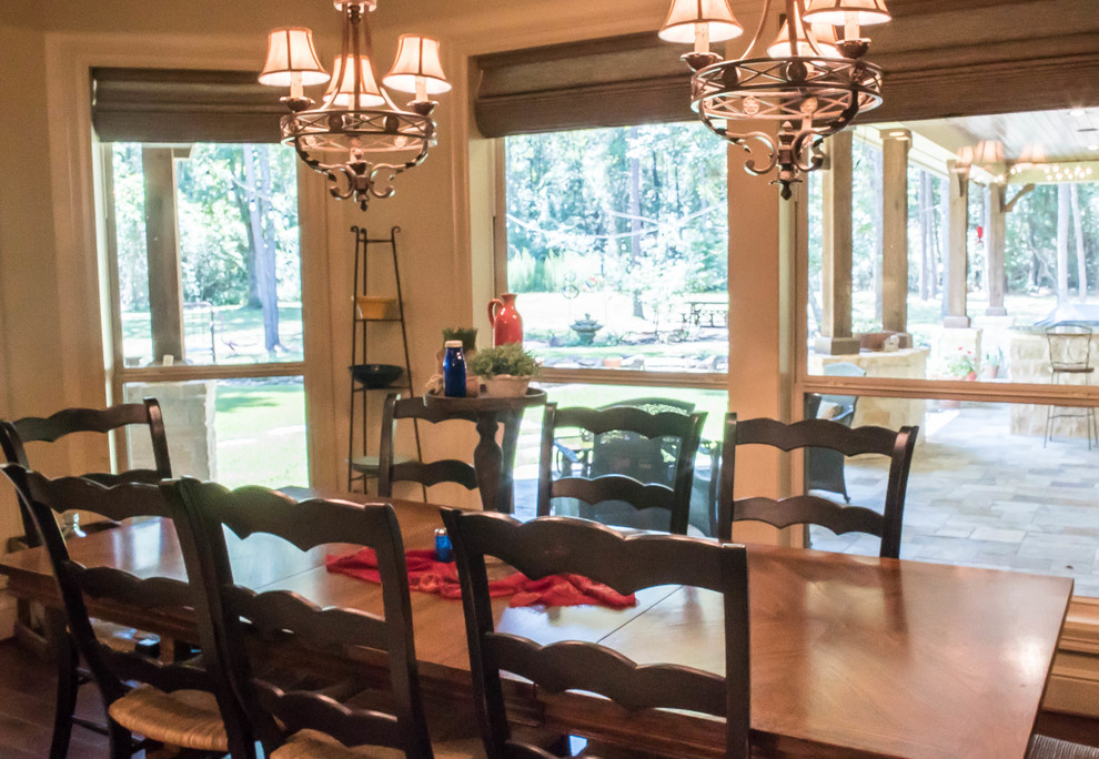 Example of a mountain style dining room design in Houston