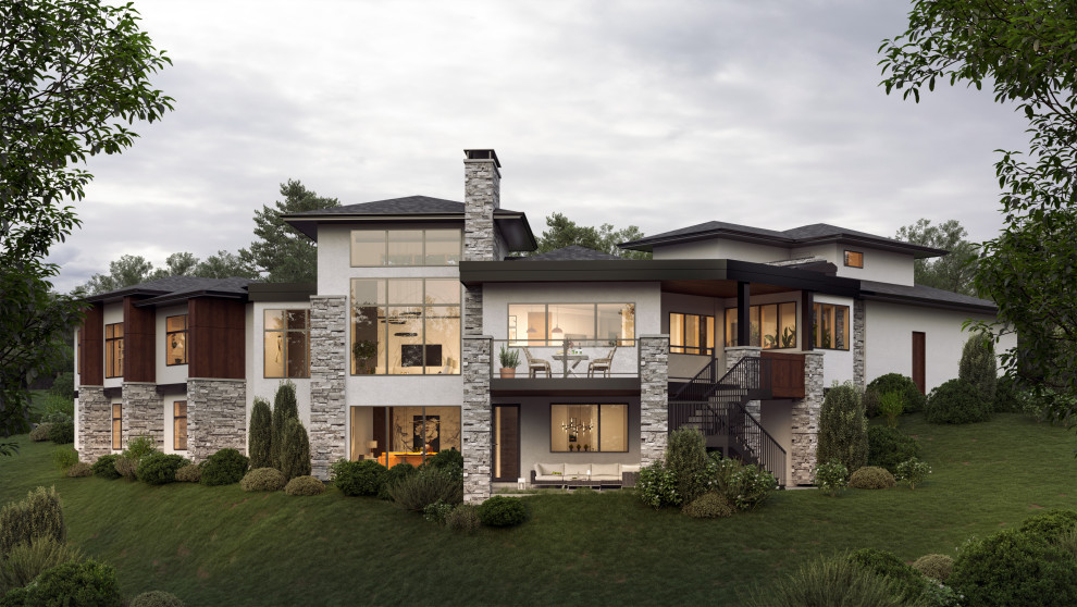 Photo of a large modern one-storey stucco white house exterior in Calgary with a shingle roof.