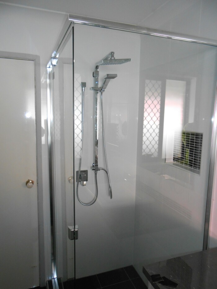 Modern bathroom in Brisbane with a corner shower.