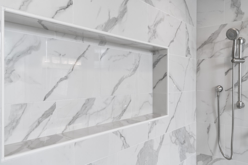 Large transitional master multicolored tile and mosaic tile porcelain tile double shower photo with gray walls, an undermount sink and quartz countertops