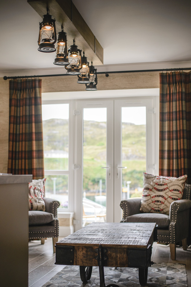 Design ideas for a small eclectic open plan living room in Other with beige walls and light hardwood flooring.