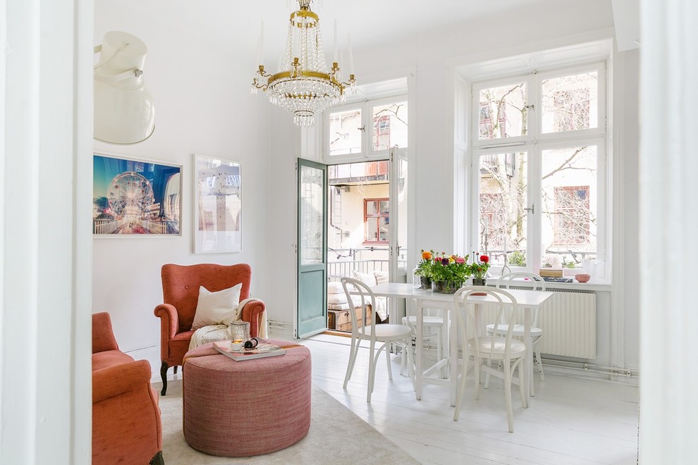 Transitional dining room in Stockholm with white walls, painted wood floors, no fireplace and white floor.