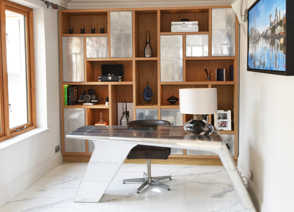Photo of a contemporary home office in Surrey.