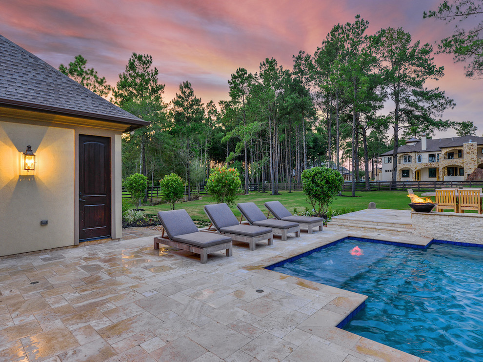 Hot tub - large transitional backyard stone and rectangular natural hot tub idea in Houston