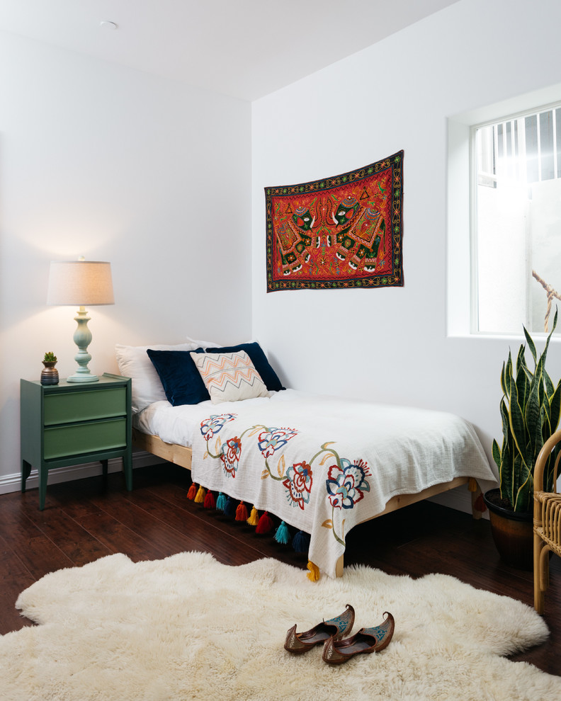 This is an example of an eclectic bedroom in Los Angeles.