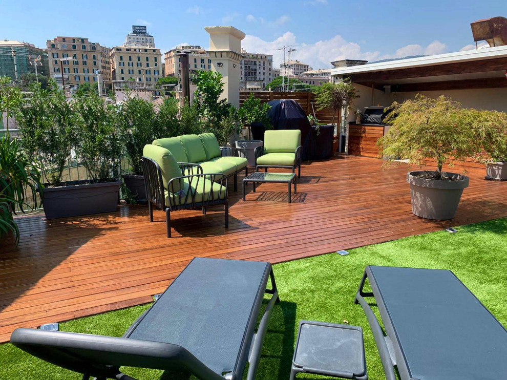 Design ideas for a mid-sized modern rooftop and rooftop deck in Other with a pergola and wood railing.