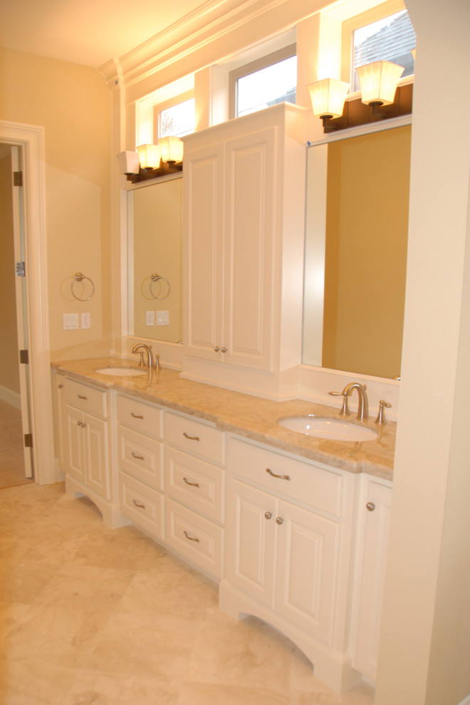 Photo of a mid-sized traditional 3/4 bathroom in Portland with shaker cabinets, white cabinets, beige walls, ceramic floors, an undermount sink, beige floor, beige benchtops, a double vanity and a built-in vanity.