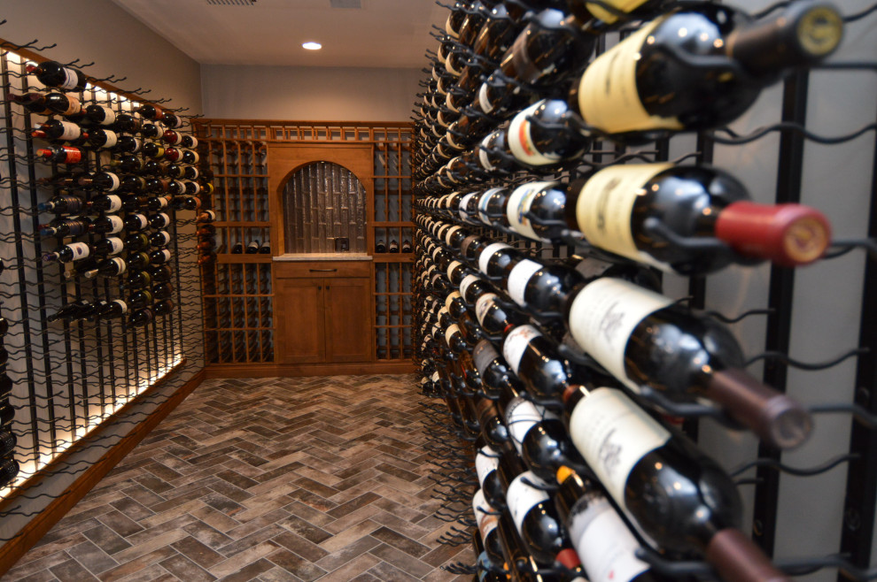 Mid-sized contemporary wine cellar in Richmond with storage racks.