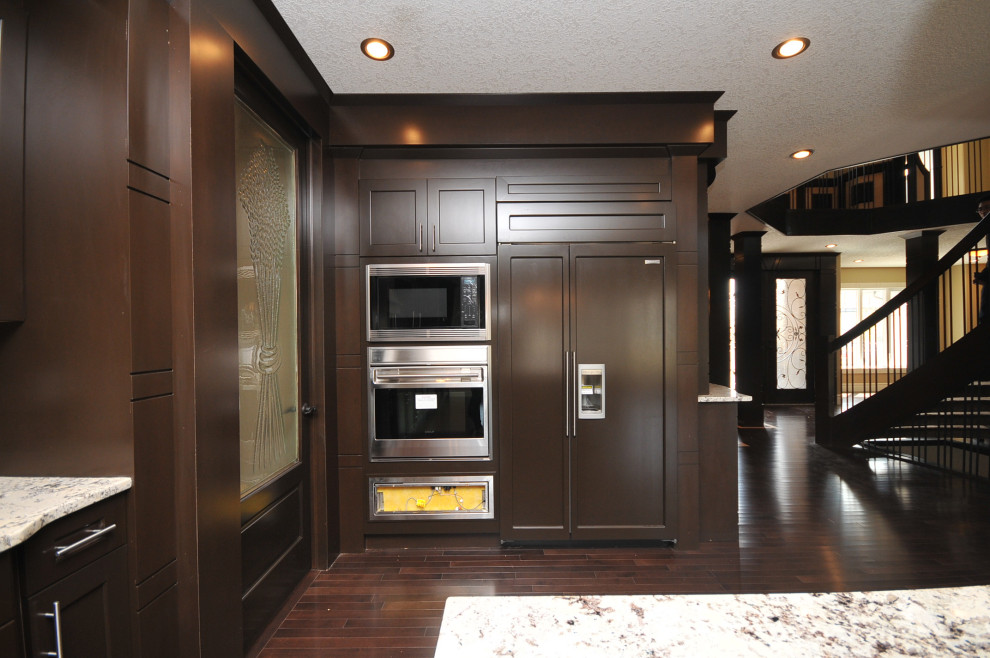 Transitional home design photo in Edmonton