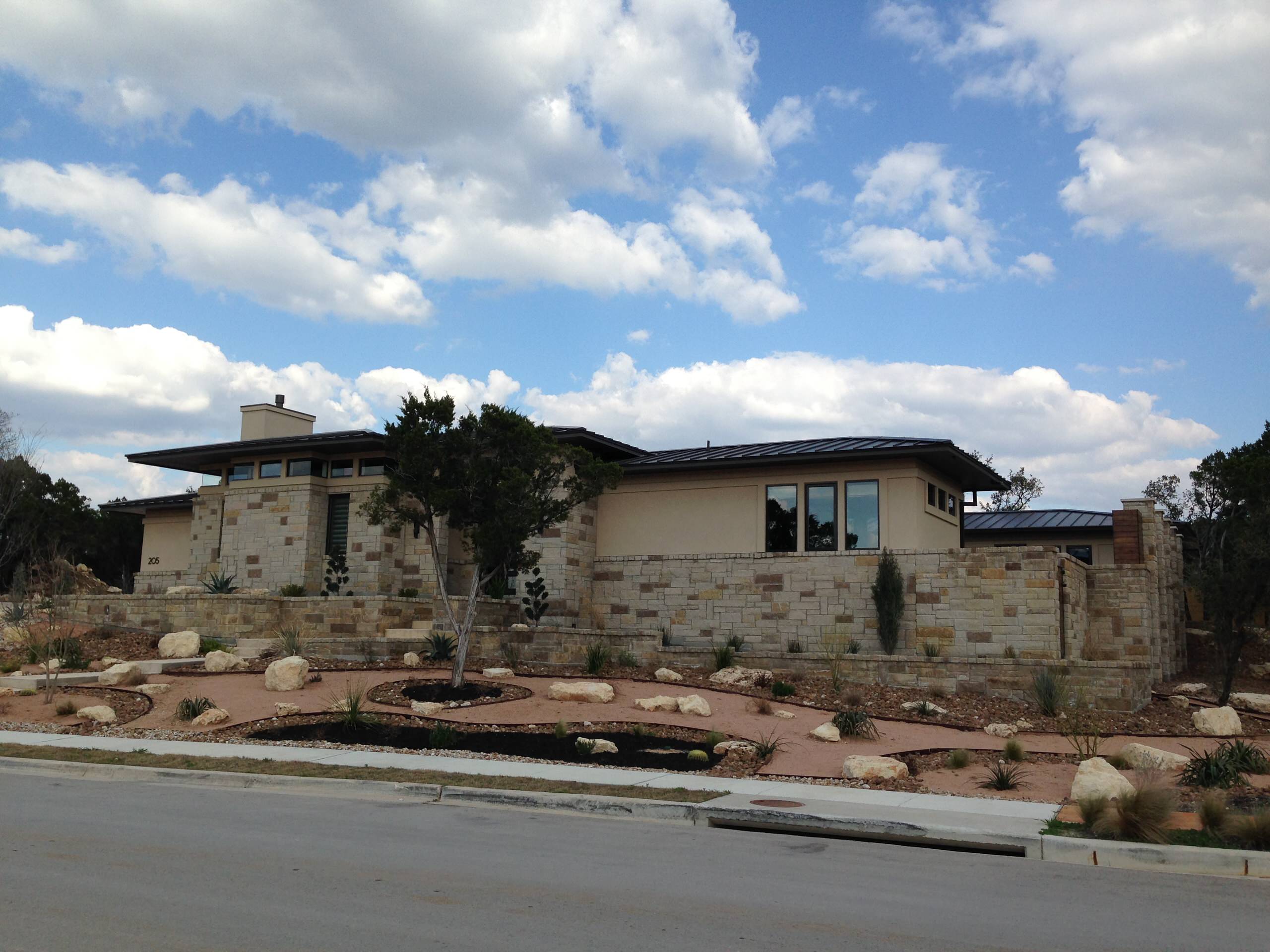 A mix of Hill Country and Prairie architecture
