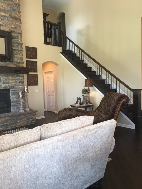 Example of a mountain style home design design in Denver