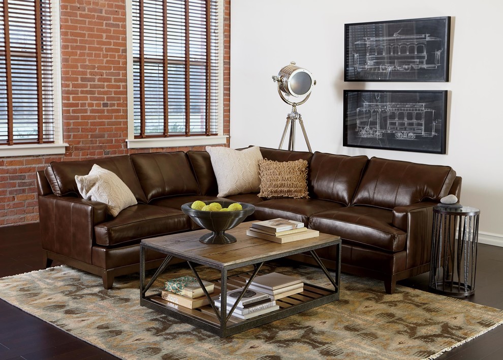 Inspiration for a small industrial formal open concept living room in New York with white walls, dark hardwood floors, no fireplace, no tv and brown floor.