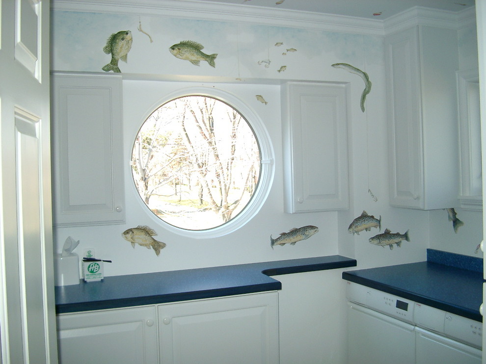 This is an example of a large beach style u-shaped dedicated laundry room in Detroit.