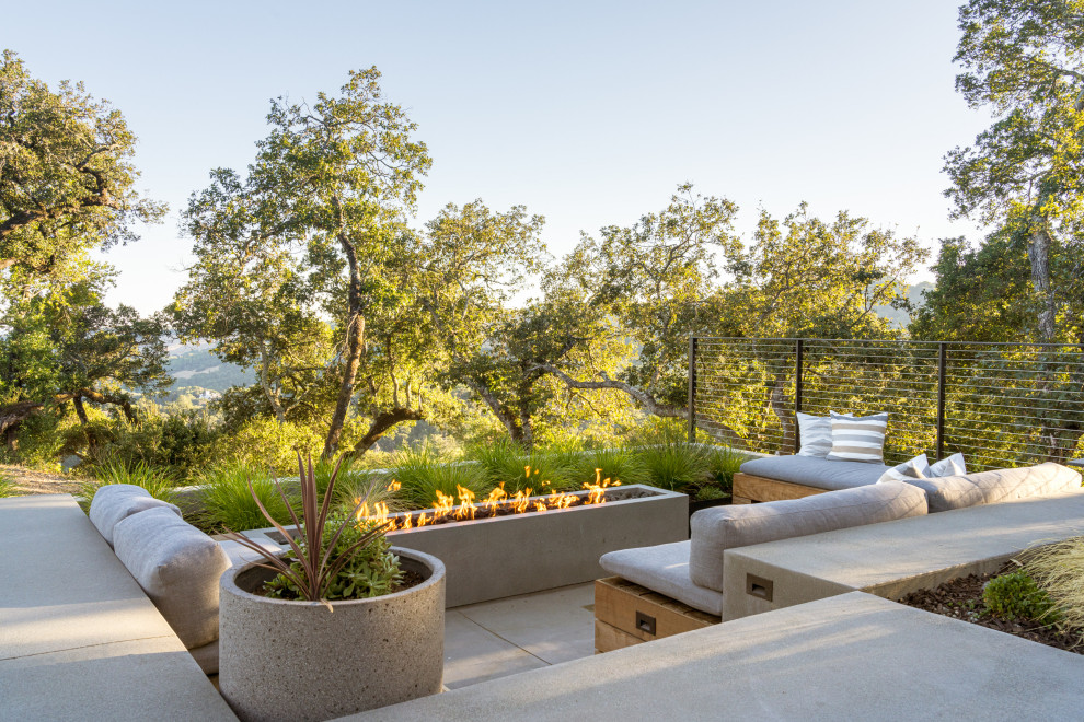 Patio - contemporary concrete patio idea with a fire pit and no cover
