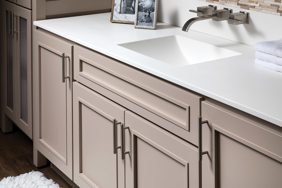 Bathroom - transitional bathroom idea in Cedar Rapids with flat-panel cabinets, beige cabinets and gray walls