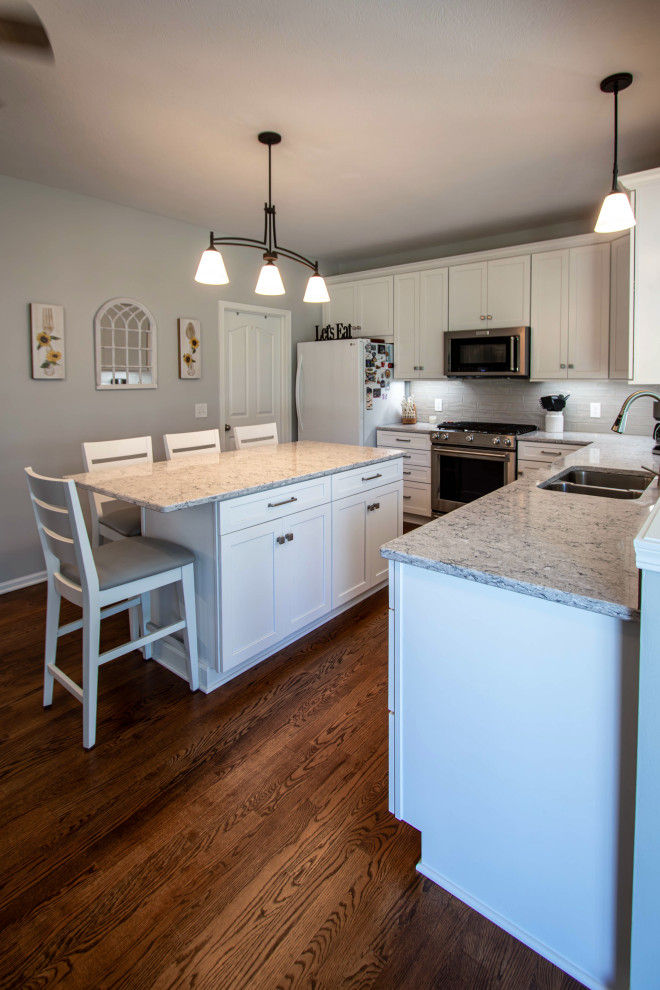 White Shaker Kitchen w/ Pietra Quartz Countertops & Gray Subway Tile ...
