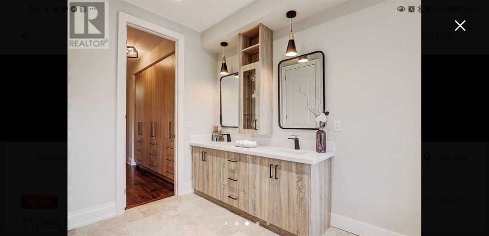 This is an example of a mid-sized midcentury 3/4 bathroom in Toronto with shaker cabinets, white cabinets, a japanese tub, a curbless shower, a two-piece toilet, white tile, mosaic tile, multi-coloured walls, porcelain floors, a drop-in sink, quartzite benchtops, multi-coloured floor, a hinged shower door, multi-coloured benchtops, a niche, a single vanity and a floating vanity.