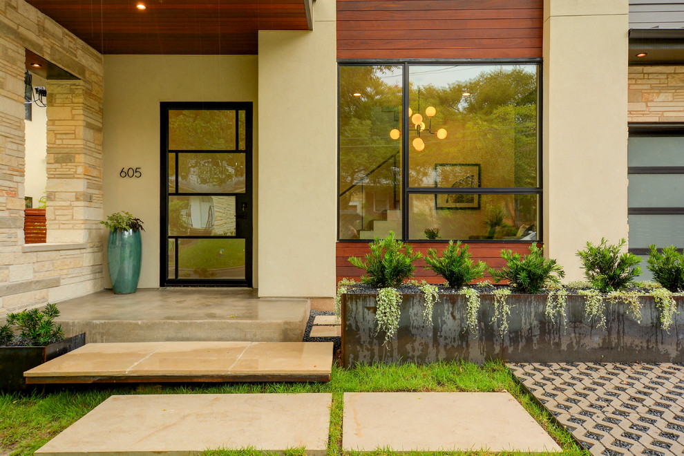 Contemporary front door in Austin with a single front door and a glass front door.