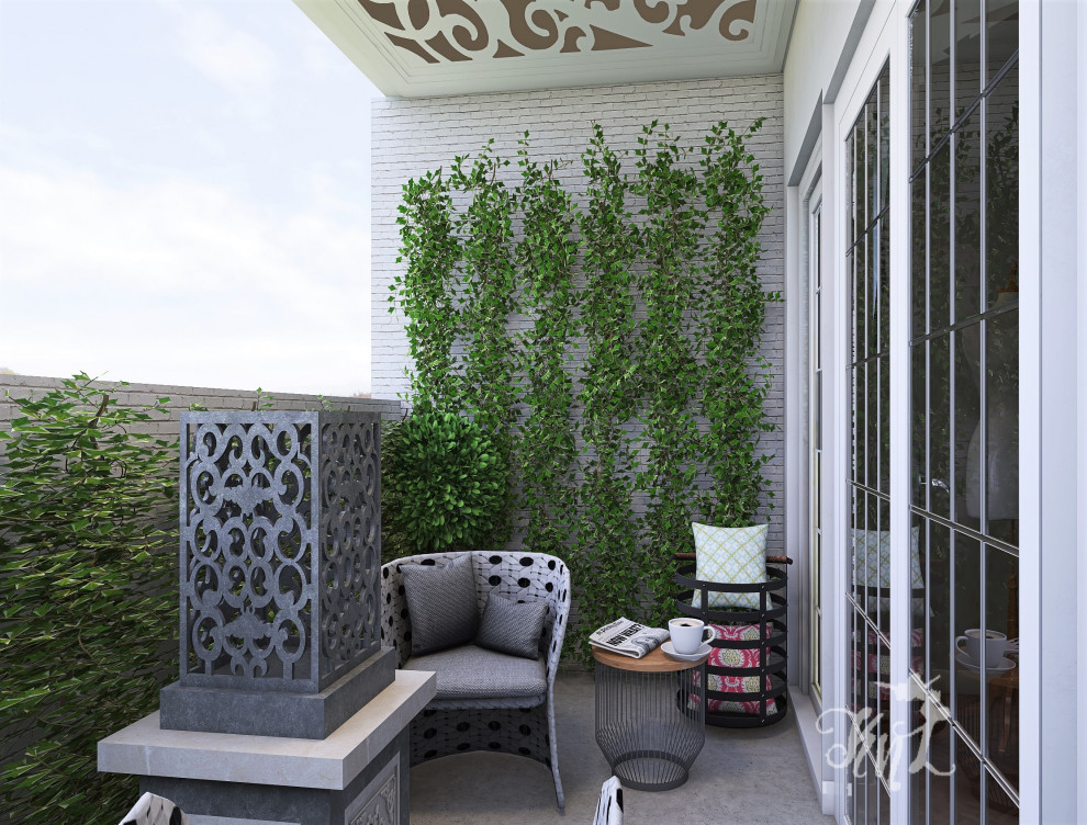 Example of a small classic privacy balcony design in Houston with a roof extension