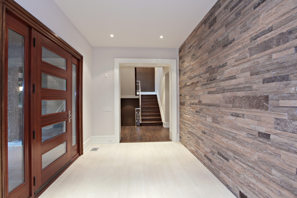 This is an example of a contemporary entryway in Toronto.