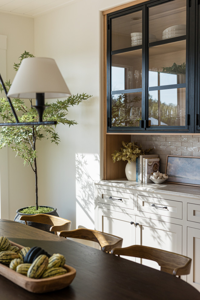 Flint Hills - Example of a transitional dining room design in Orange County
