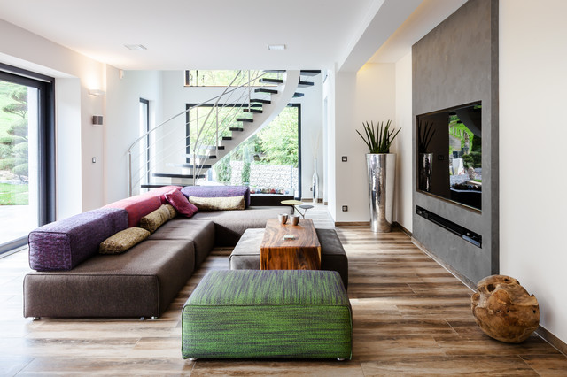 Wohnbereich mit brauner Couch und Multimediawand modern-wohnbereich